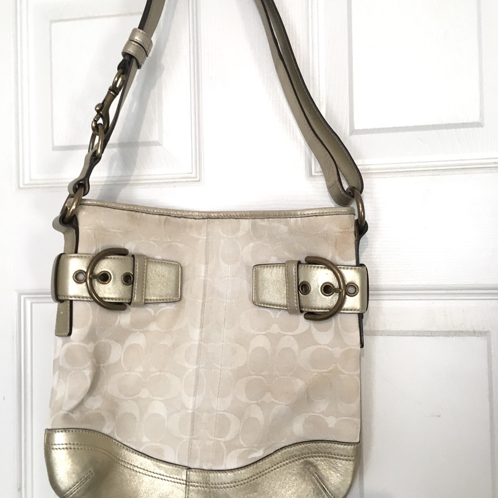 Coach Signature hobo shoulder bag. Cream/Off-White w/Gold leather trim/accents.